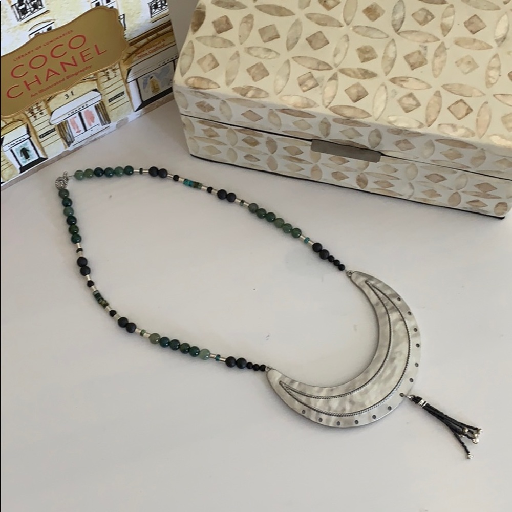 Breast place necklace.